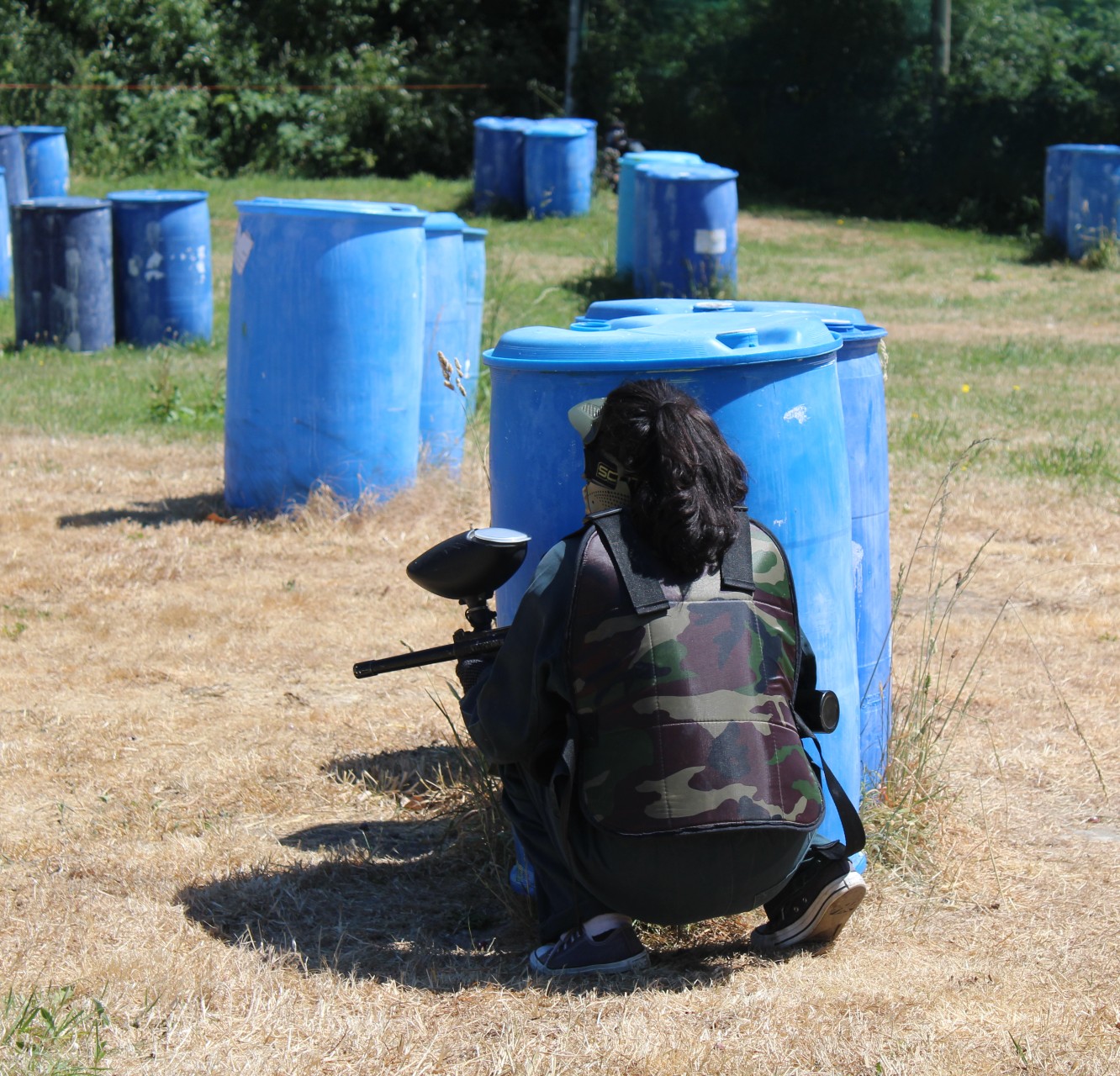 image of students paintballing